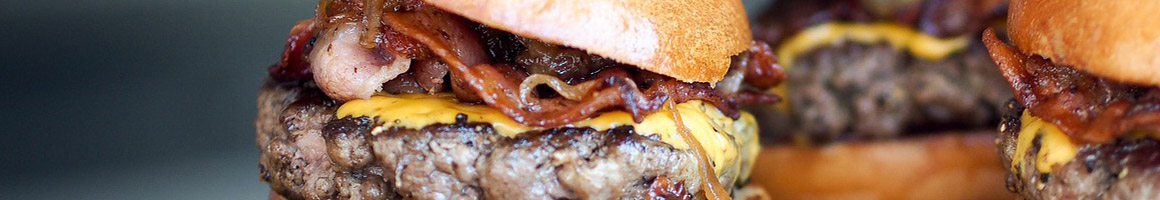 Eating Burger at Burger Station restaurant in Sacramento, CA.